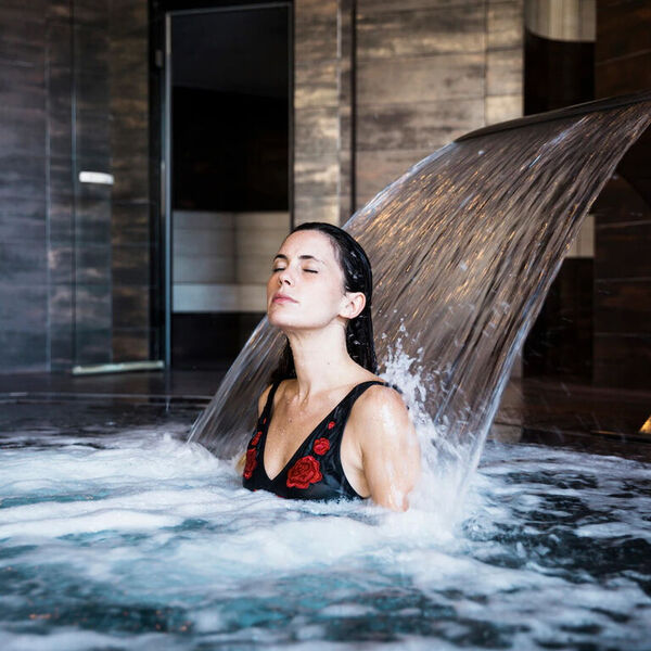 spa-concept-with-woman-relaxing-in-water_23-2148000169__1_.jpg